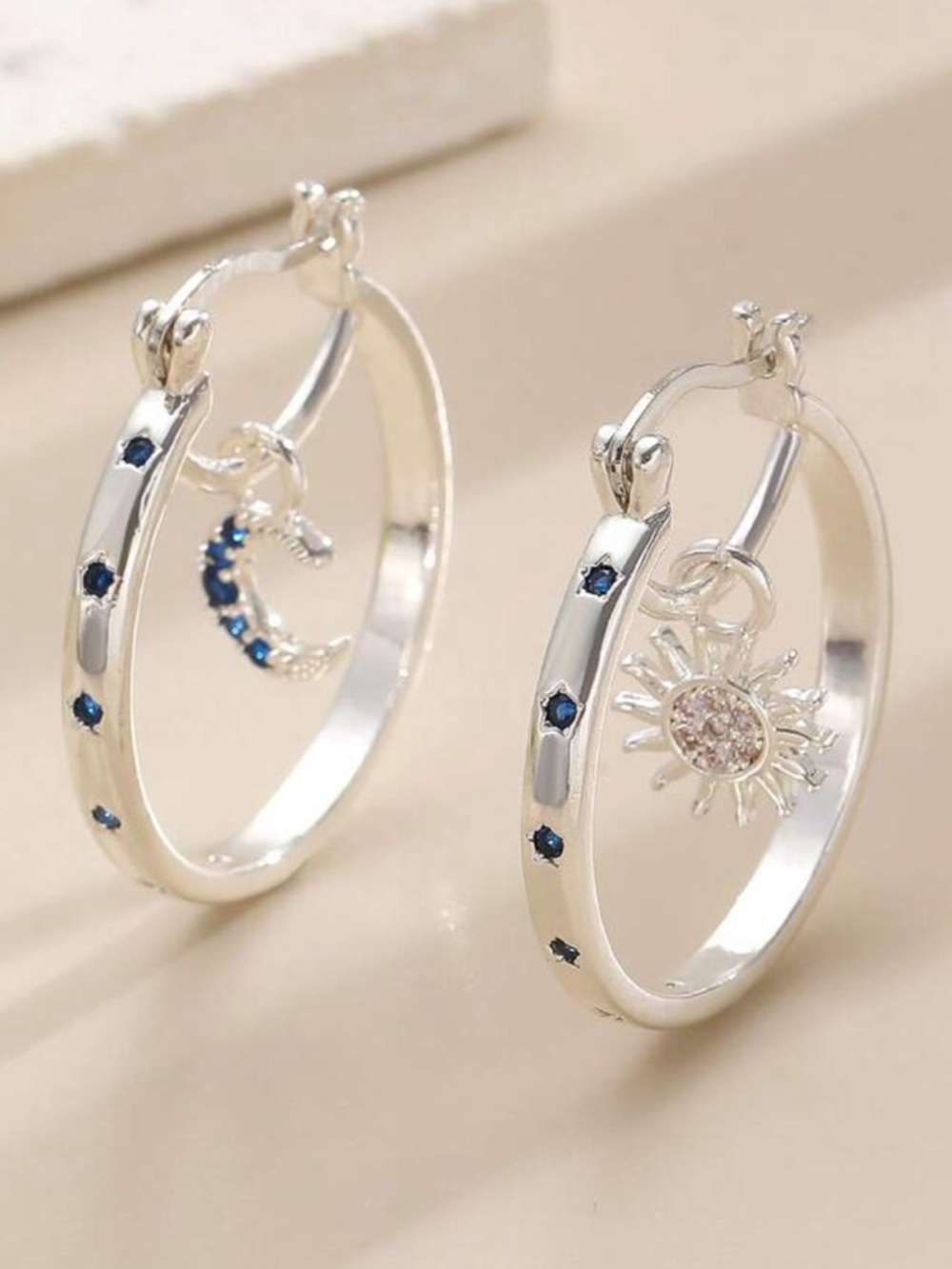 Silver Hoop Earrings with Blue Crystal Accents and Sun & Moon Charms